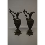 Pair of Cast Metal Jugs with Cherub Design