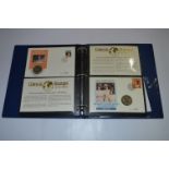 Album of Royalty Commemorative Mint Coins and Stamps
