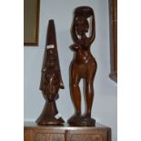 Two African Carved Wood Figurines "Water Carrier" and a Bust