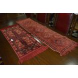 Two Small Red Pattern Runner Rugs