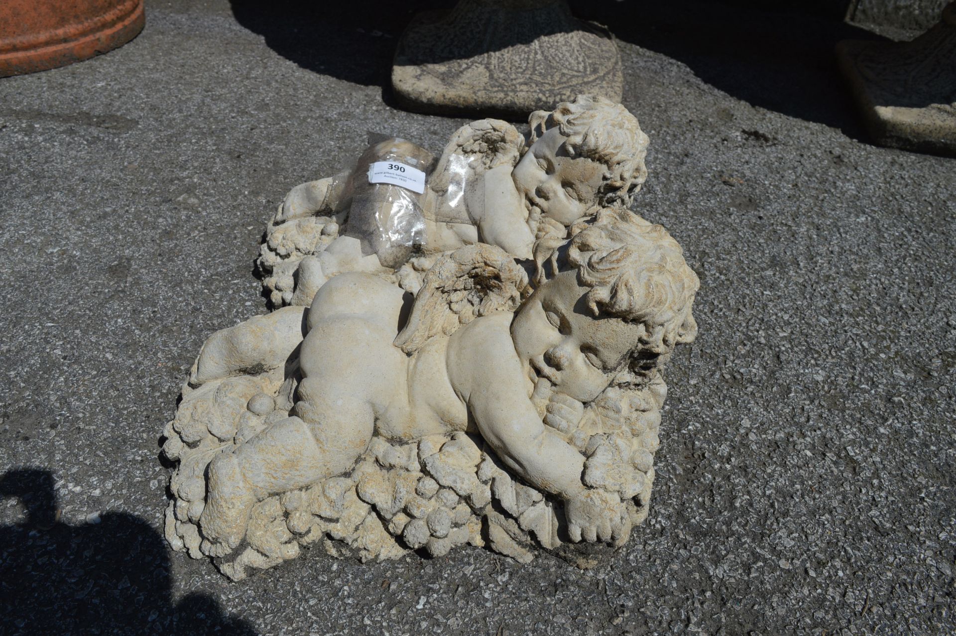 Pair of Limestone Garden Cherubs