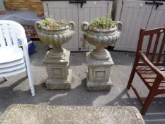 Pair of Ornamental Garden Urns on Plinths