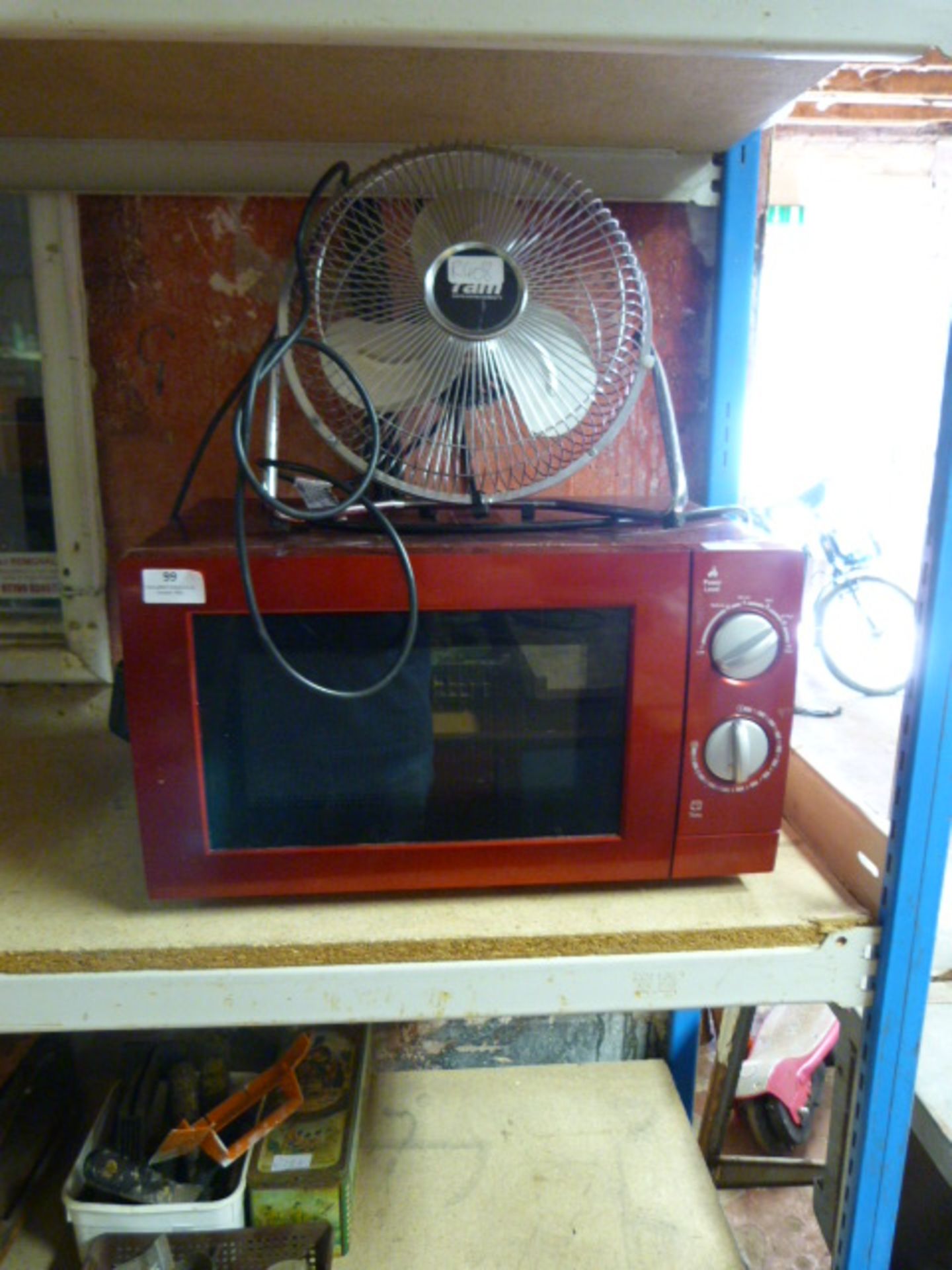 Domestic Microwave Oven and a Cooling Fan