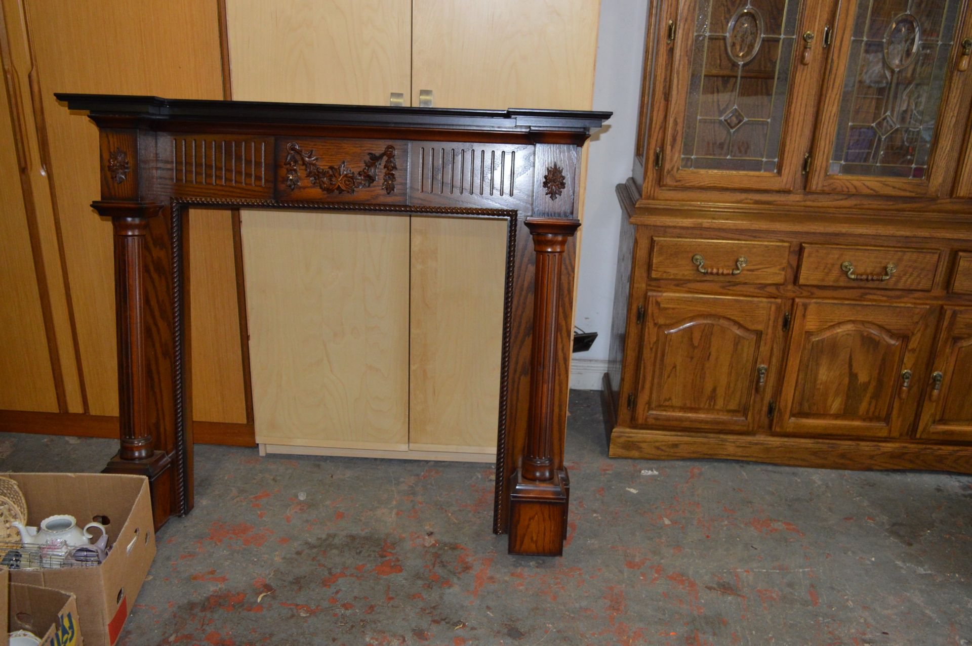 Ornate Oak Fire Surround with Columns and Floral Decoration