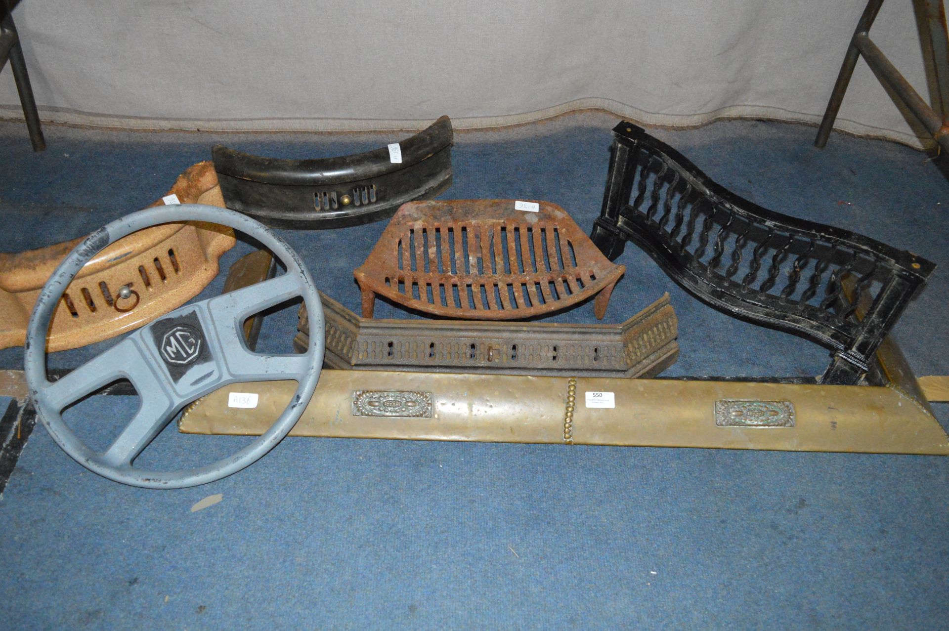 Selection of Brass and Cast Iron Place Fenders, Fire Fronts, Dog Grate and a MG Steering wheel