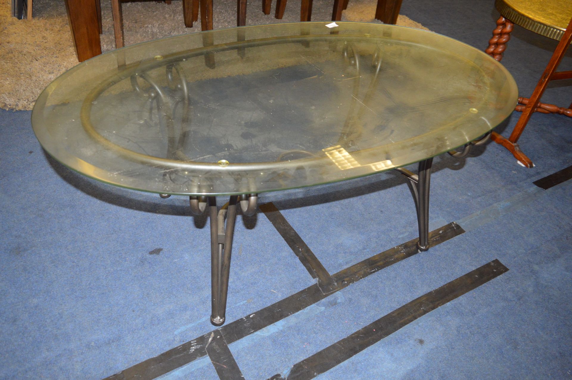 Wrought Metal Based Oval Glass Topped Coffee Table