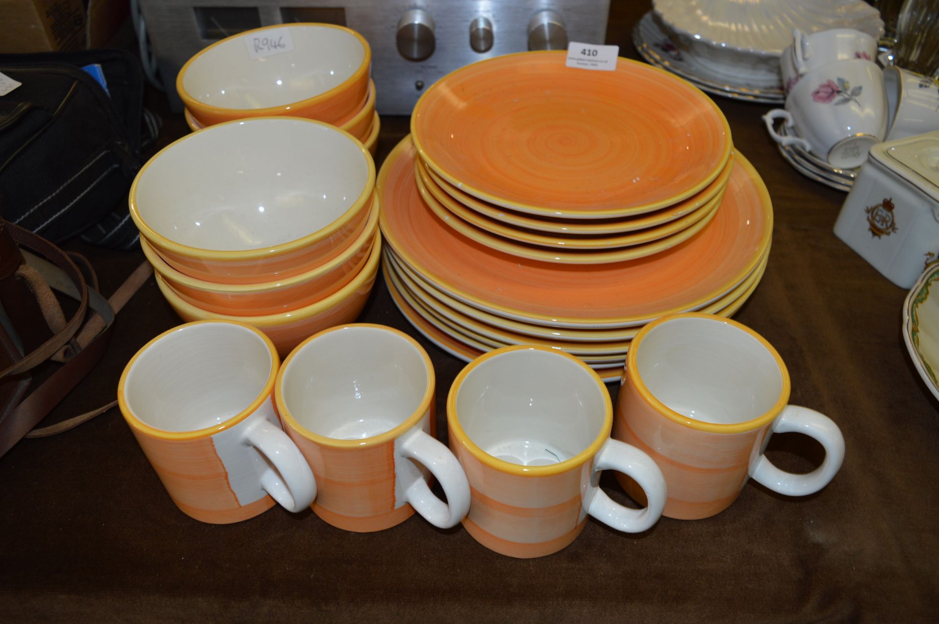 Set of Orange Painted Dinnerware and Mugs