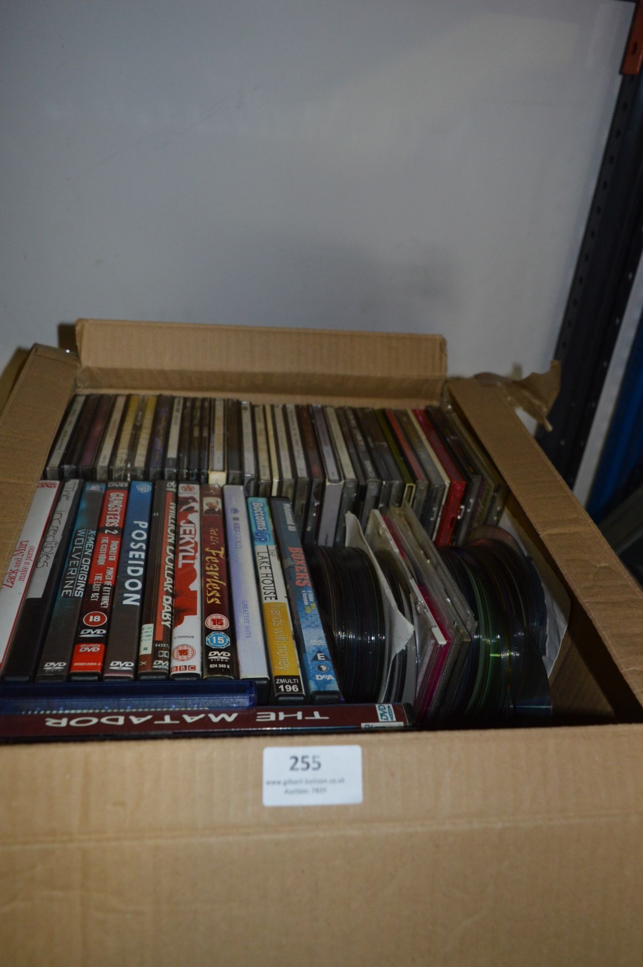 Box Containing CDs and DVDs