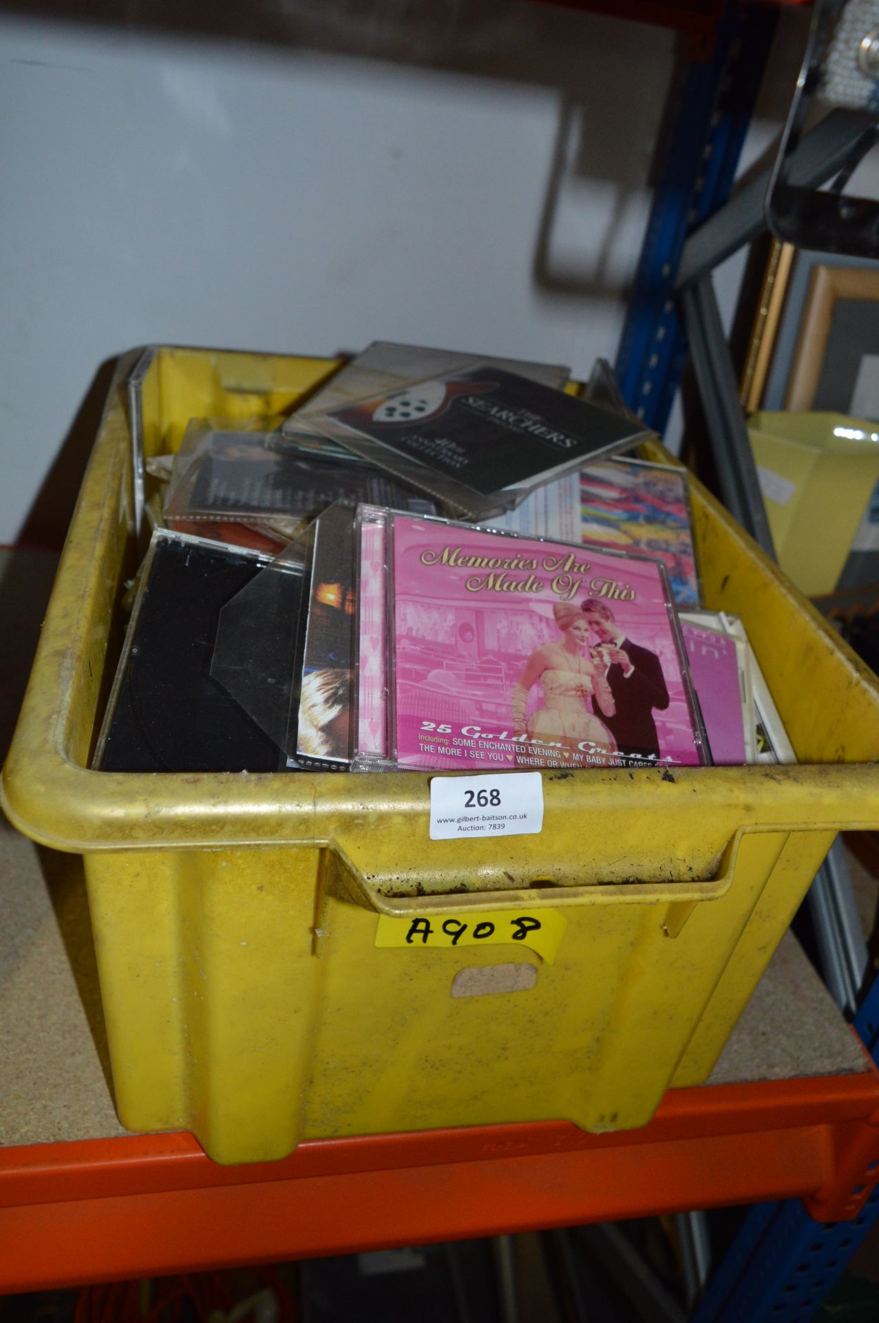 Plastic Box Containing a Quantity of CDs