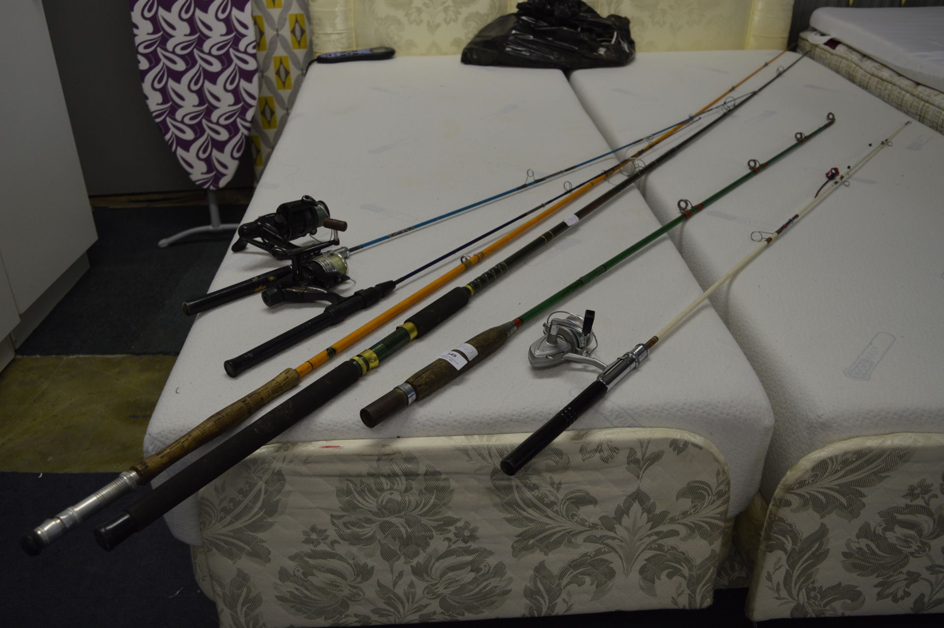 Six Fishing Rods and Three Reels