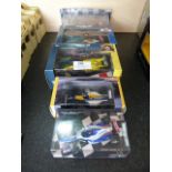 Five Boxed Diecast Model Racing Cars