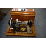 Walnut Cased Frister & Rossmann Sewing Machine
