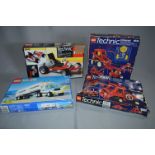 Four Boxed Lego and Lego Technic