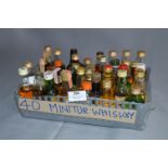 Forty Miniature Whiskey Bottles