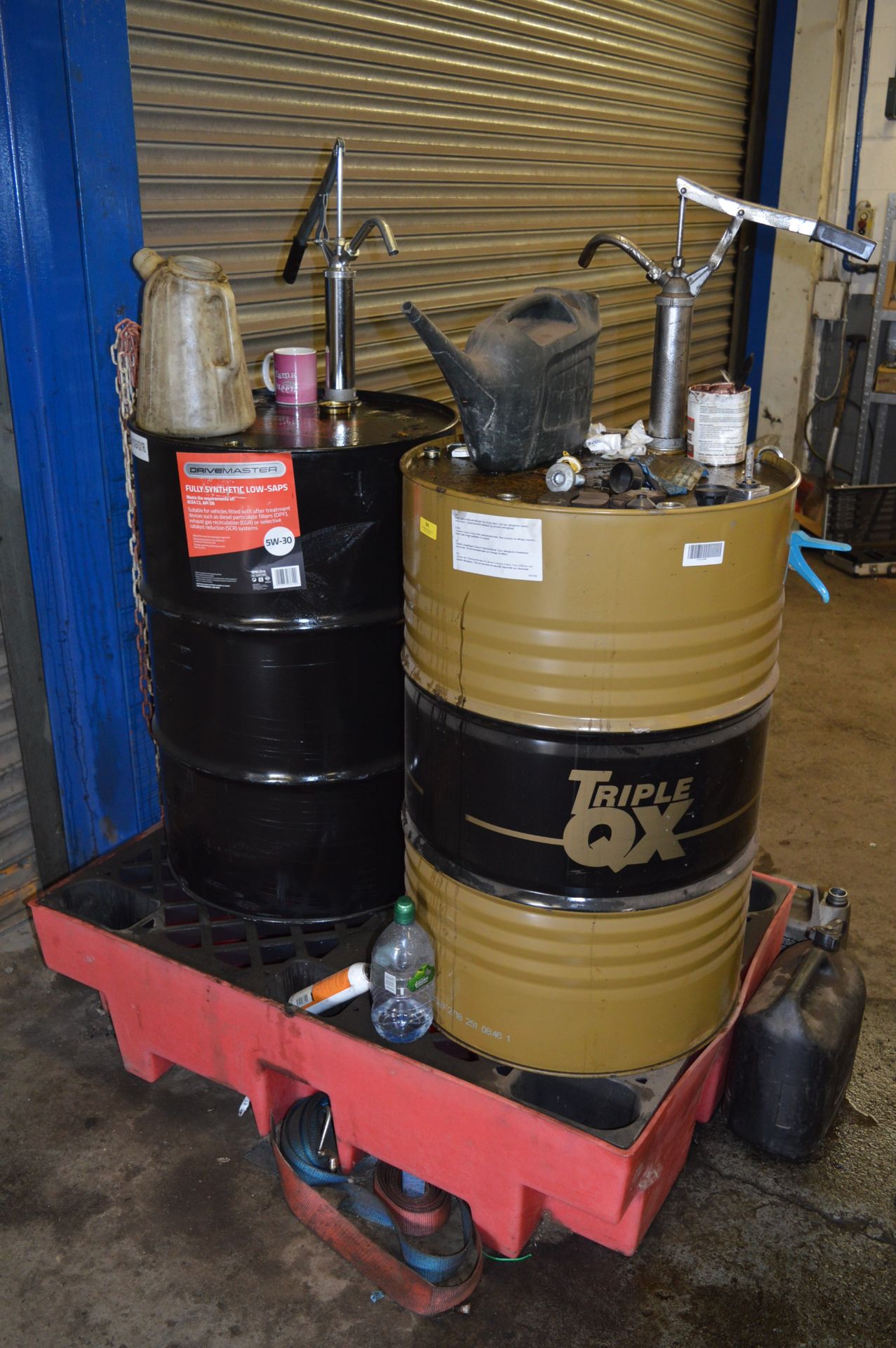 *Two Part Barrels of Engine Oil on a Stand