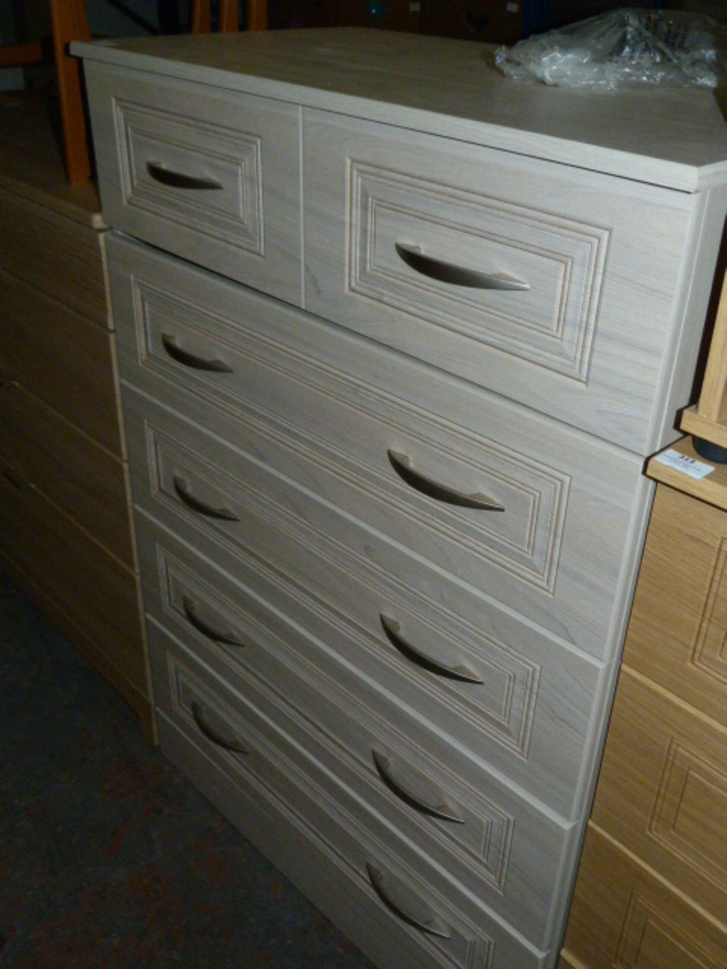 *Limed Oak and Silver Chest of Five Drawers