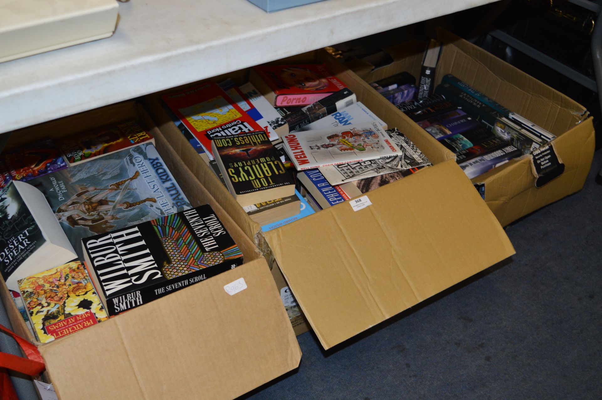 Three Boxes Containing a Large Quantity of Hardback and Paperback Books