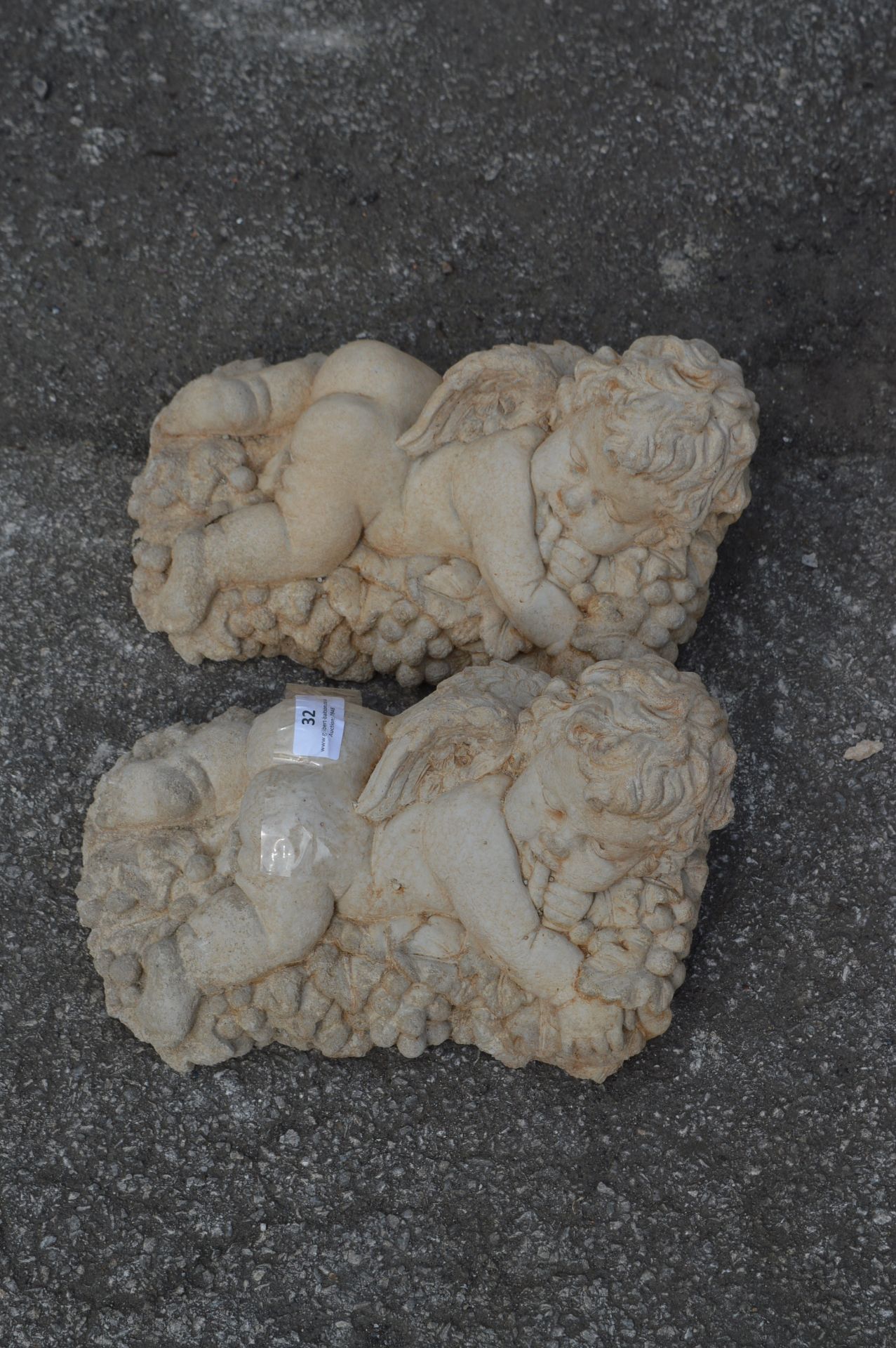 Pair of Reconstituted Limestone Sleeping Cherubs