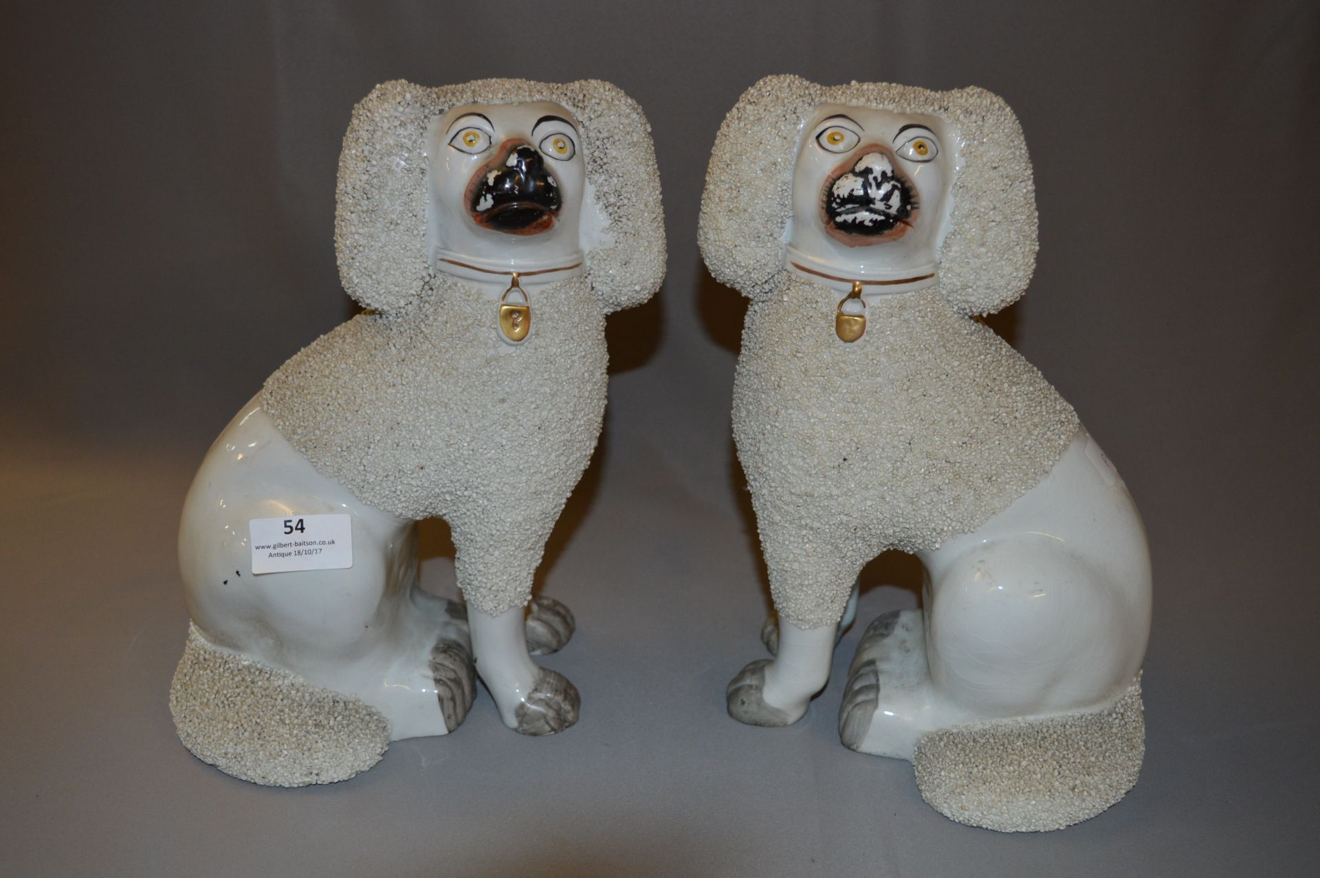 Pair of Staffordshire Poodle Figurines
