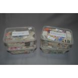 4 Tubs containing Stamps from New Zealand, Italy, Netherlands & Canada