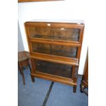 Oak Three Sectioned Bookcase with Fold Over Doors