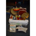 Box containing Tambourines, Spinning Top, Wood Blocks, Small Case etc