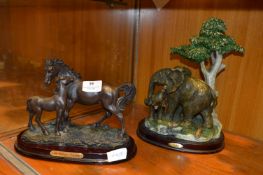 Two Pottery Ornaments on Plinths "Hose & Foal" and " Elephant & Calf"