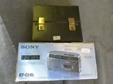 Sony Radio Cassette and Case of Cassette Tapes