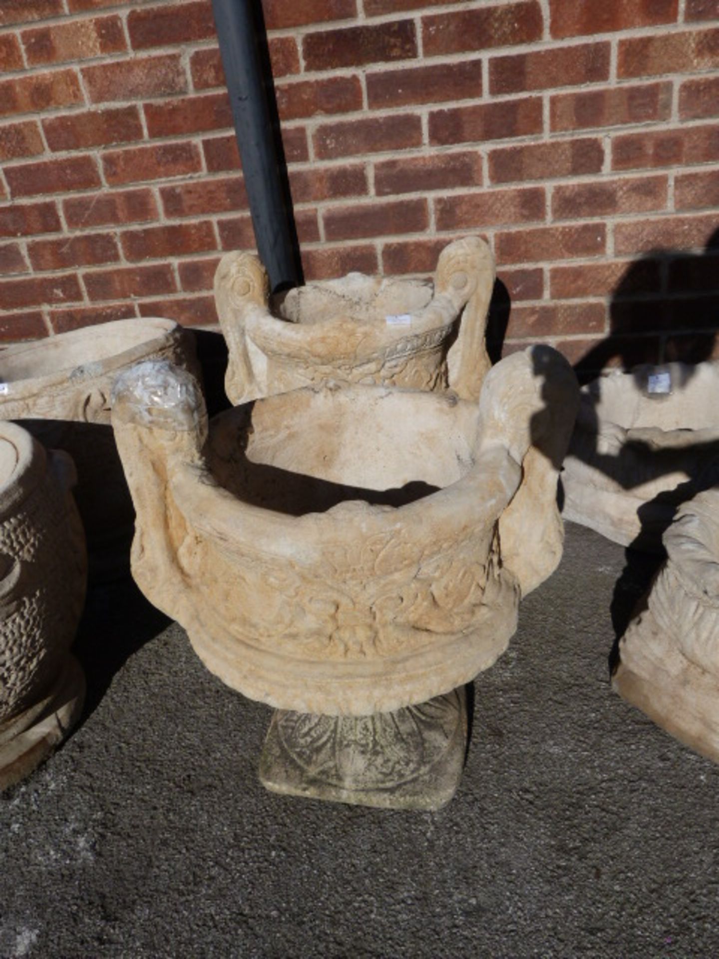 Pair of Reconstituted Limestone Garden Urns on Plinths