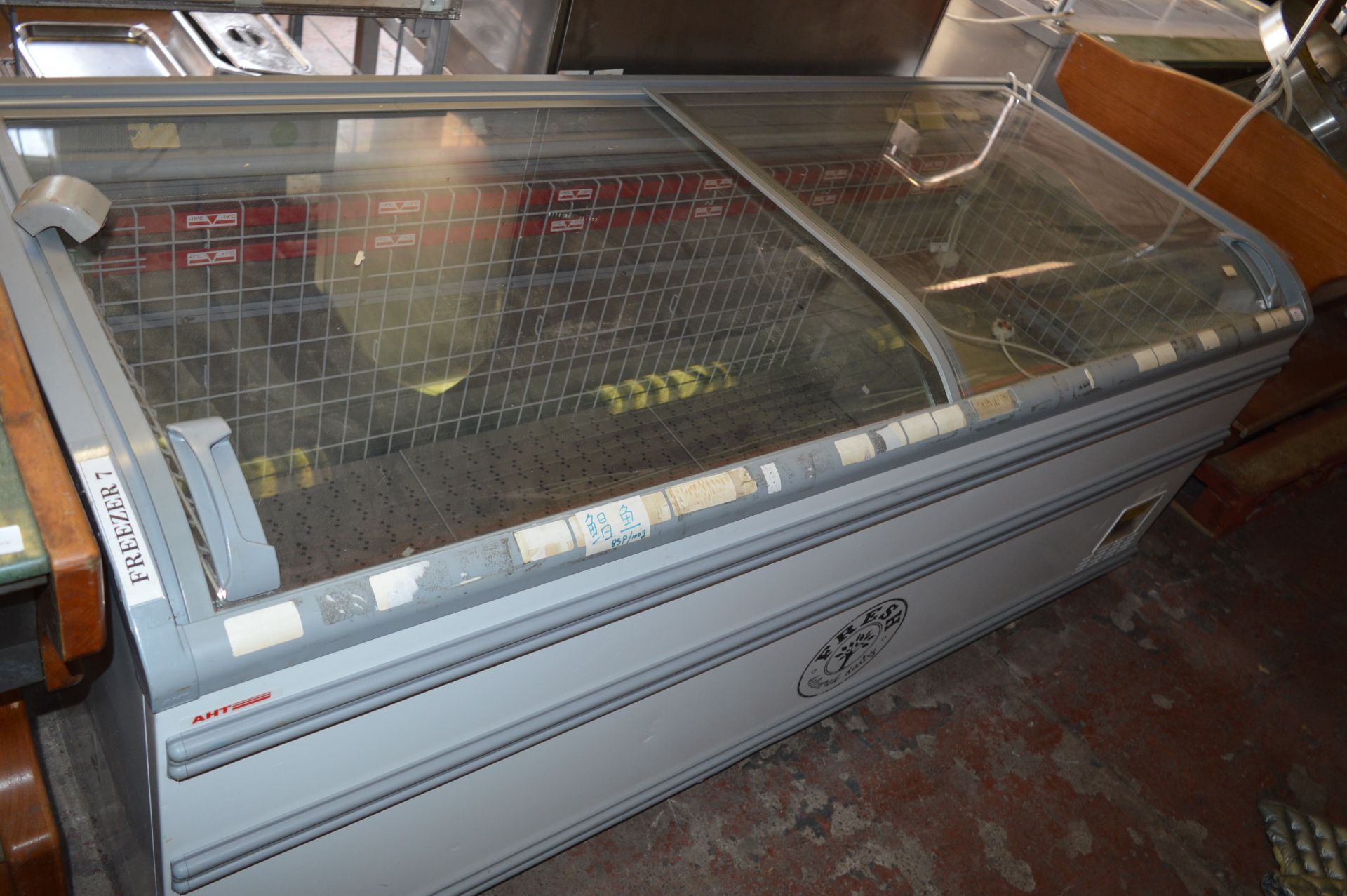 Display Freezer Enclosed by Sliding Domed Glass Lid