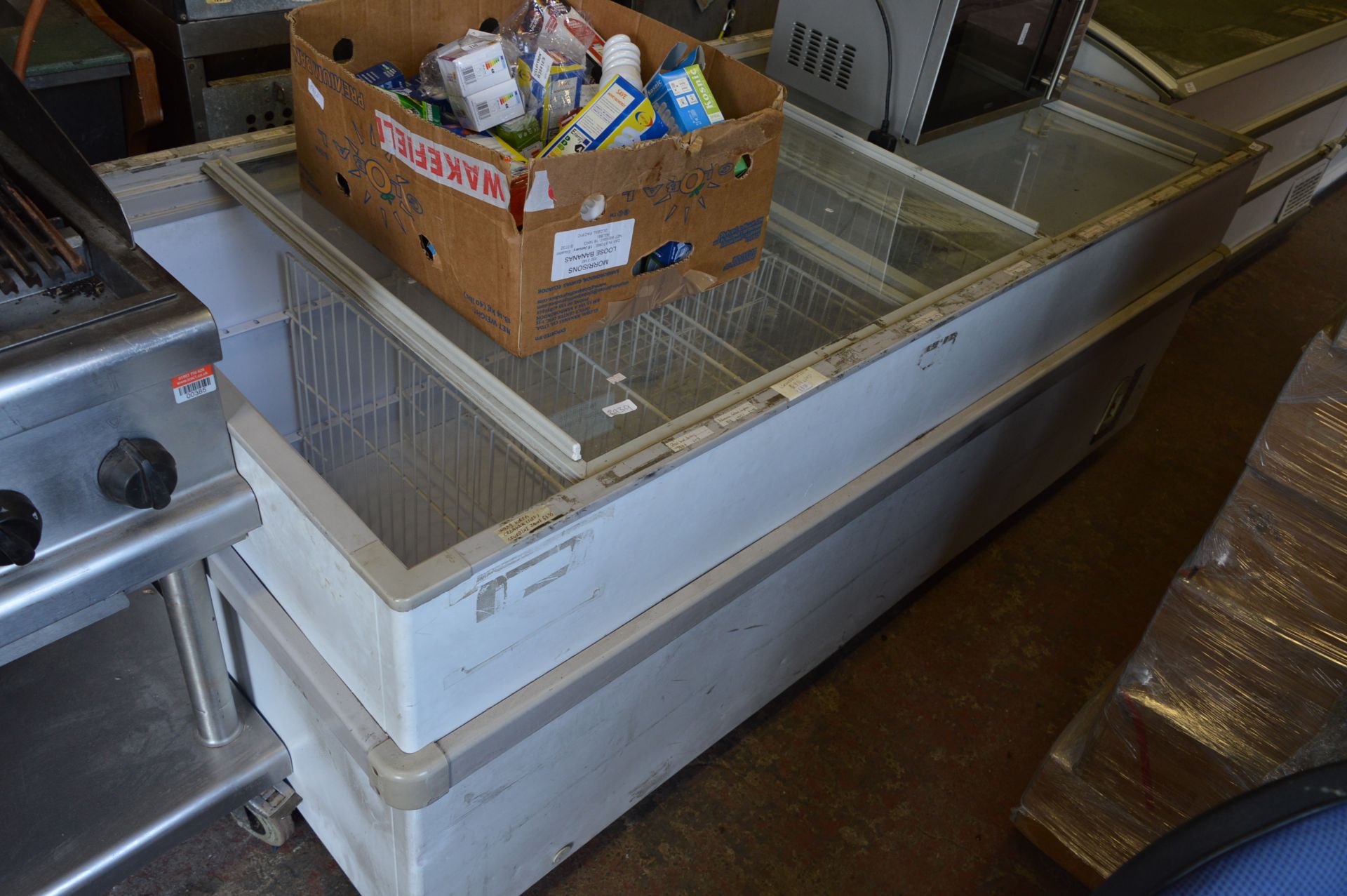 *Display Freezer Enclosed by Sliding Glass LId