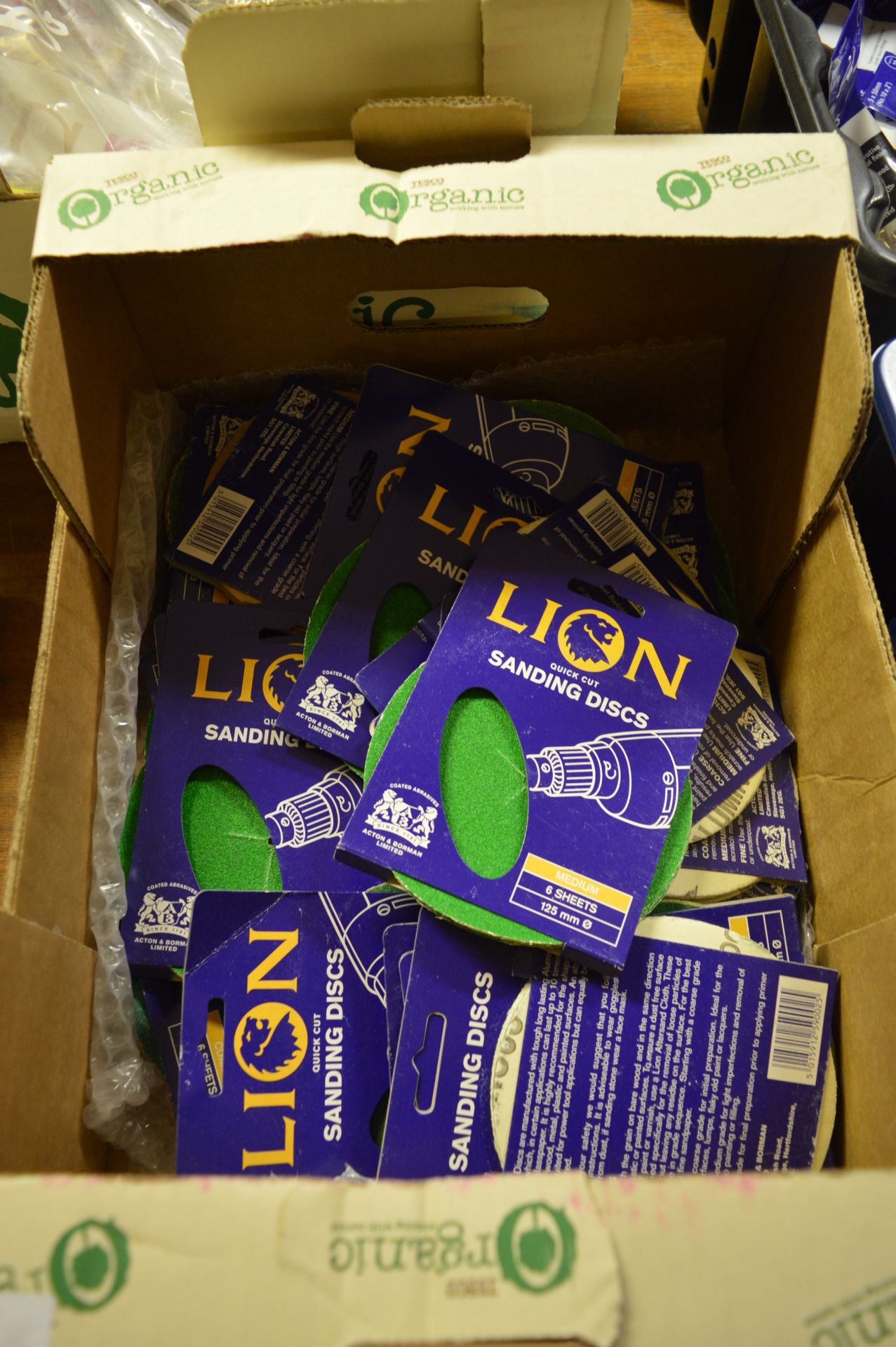 Box Containing Various Packs of 125mm Lion Sanding Disks