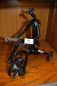 Wrought Metal Figurine "Jester on Tricycle"