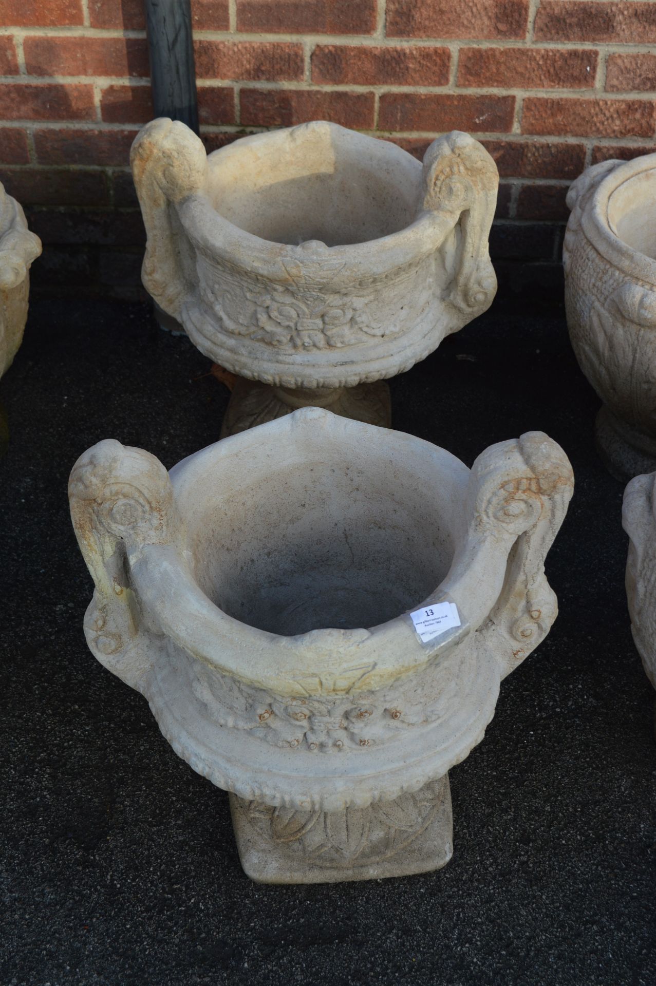 Pair of Garden Urns on Plinths