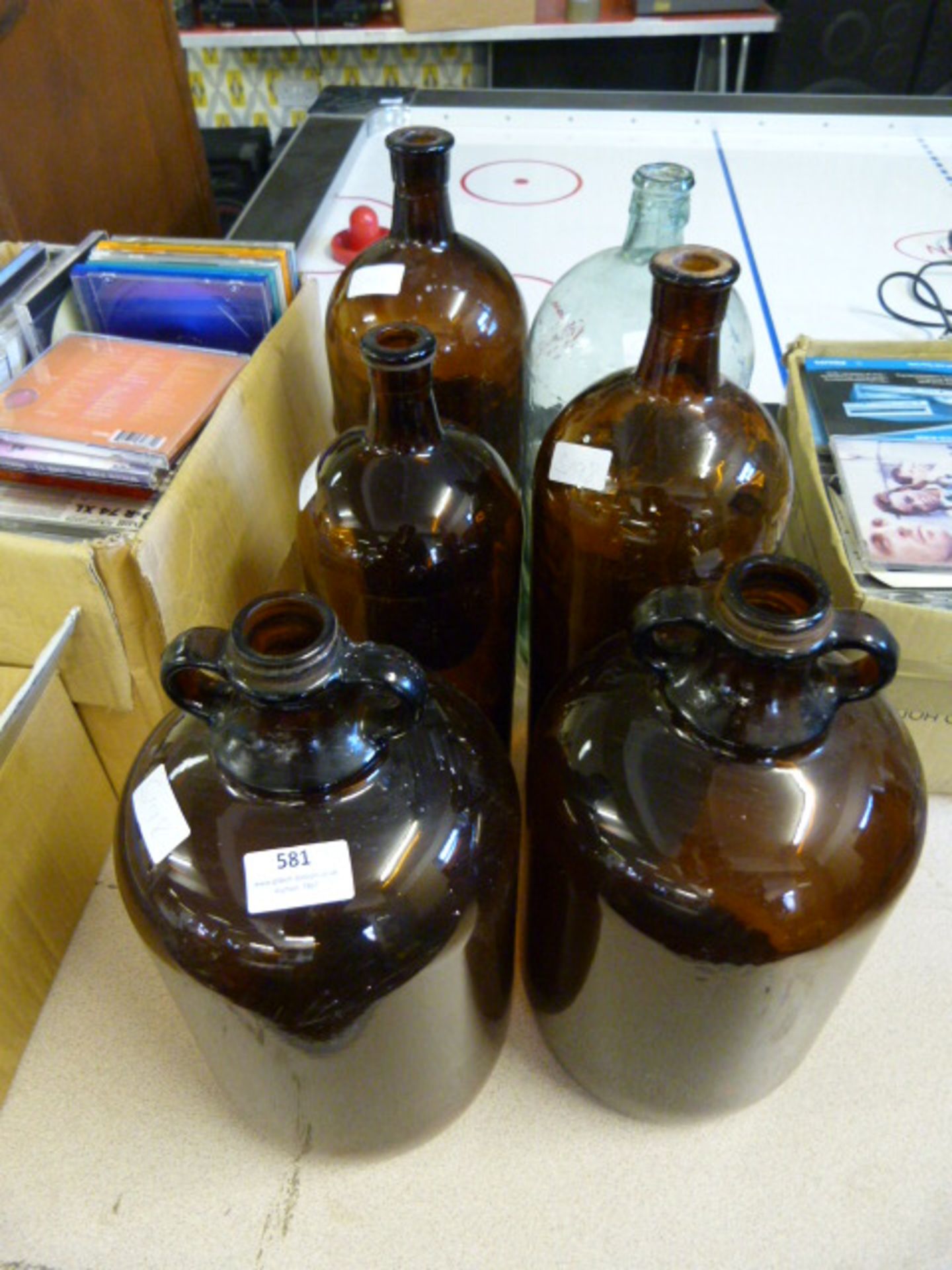 Brown Glass Demijohns and Bottles