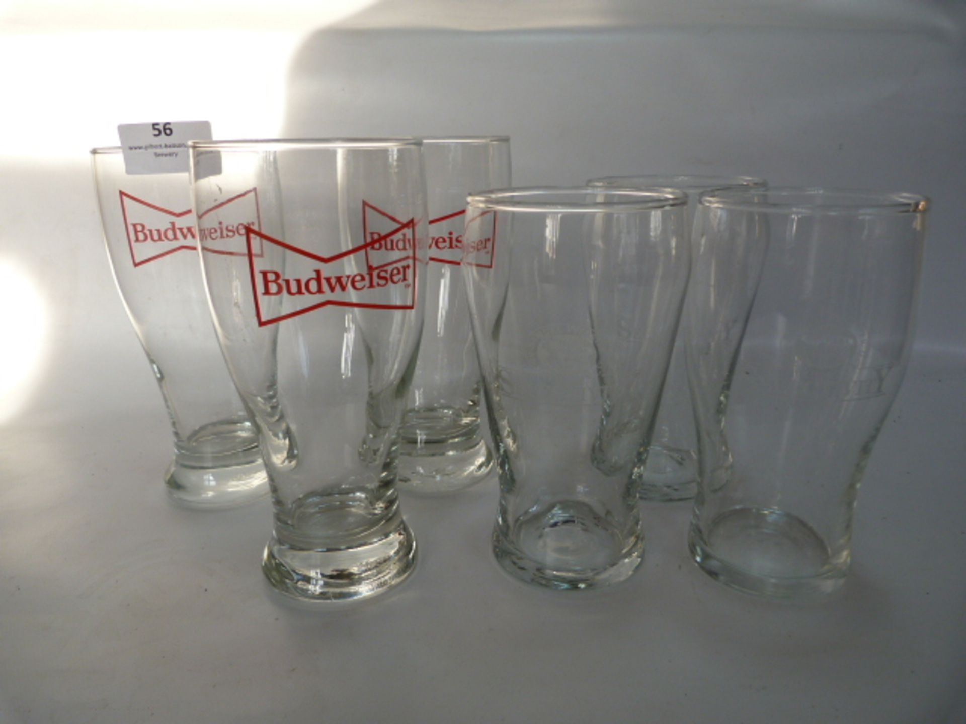 Three Budweiser Pint Glasses and Three Samuel Webs