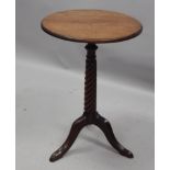 A Colonial style hardwood occasional table, the circular top on a spirally turned column and