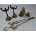 Various fire related implements, to include a pair of cast coppered fire dogs, matching poker and