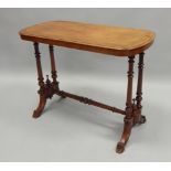 A Victorian walnut occasional table, the rectangular top with rounded ends, on turned supports