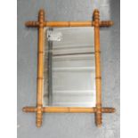 A Victorian simulated bamboo rectangular wall mirror, 59cm x 45cm.