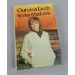 A copy of Out on a Limb by Shirley McLaine, published by Elmtree Books of London, signed and