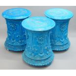 A set of three Minton Victorian cylindrical pedestals or garden seats, each decorated with flowers