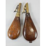 Two brown leather and brass powder flasks, unmarked.