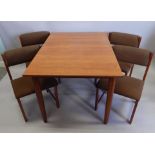 A Retro teak Bath Cabinet Makers. An extending dining table, the rectangular top with one loose