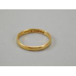 A 22ct gold wedding band, of part textured outline, 2.5g