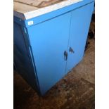 A two door steel cupboard This lot is for sale WITHOUT RESERVE. Viewing is by appointment with The