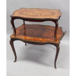 A late 19th/early 20thC French mahogany and marquetry two tier etagere, the shaped top decorated