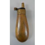 A small brass powder flask, of plain form, unmarked.