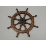 A teak brass and iron ship's wheel, lacking maker's mark, 92cm wide Provenance: Butterfields,