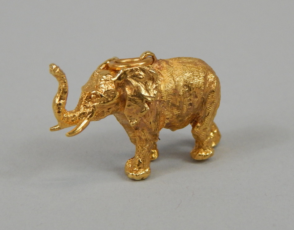 A 9ct gold elephant charm or pendant, in the brushed style, 11.2g all in.